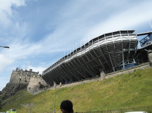 Edinburgh Castle with a giant concert stadium on the grounds
